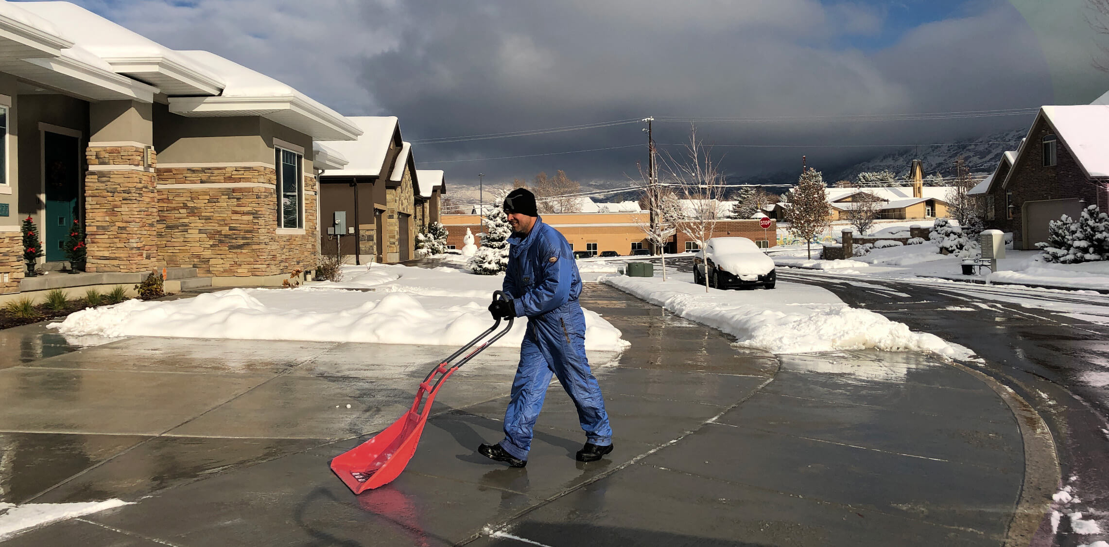 shoveling snow at residential property